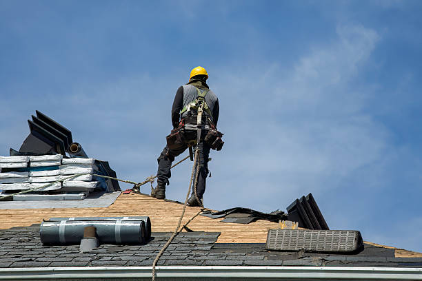 Professional Flat Roof Repair technician working in Atkins, AR